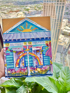 The "Taste the Rainbow" house float on Ponce de Leon Street. / Main Image